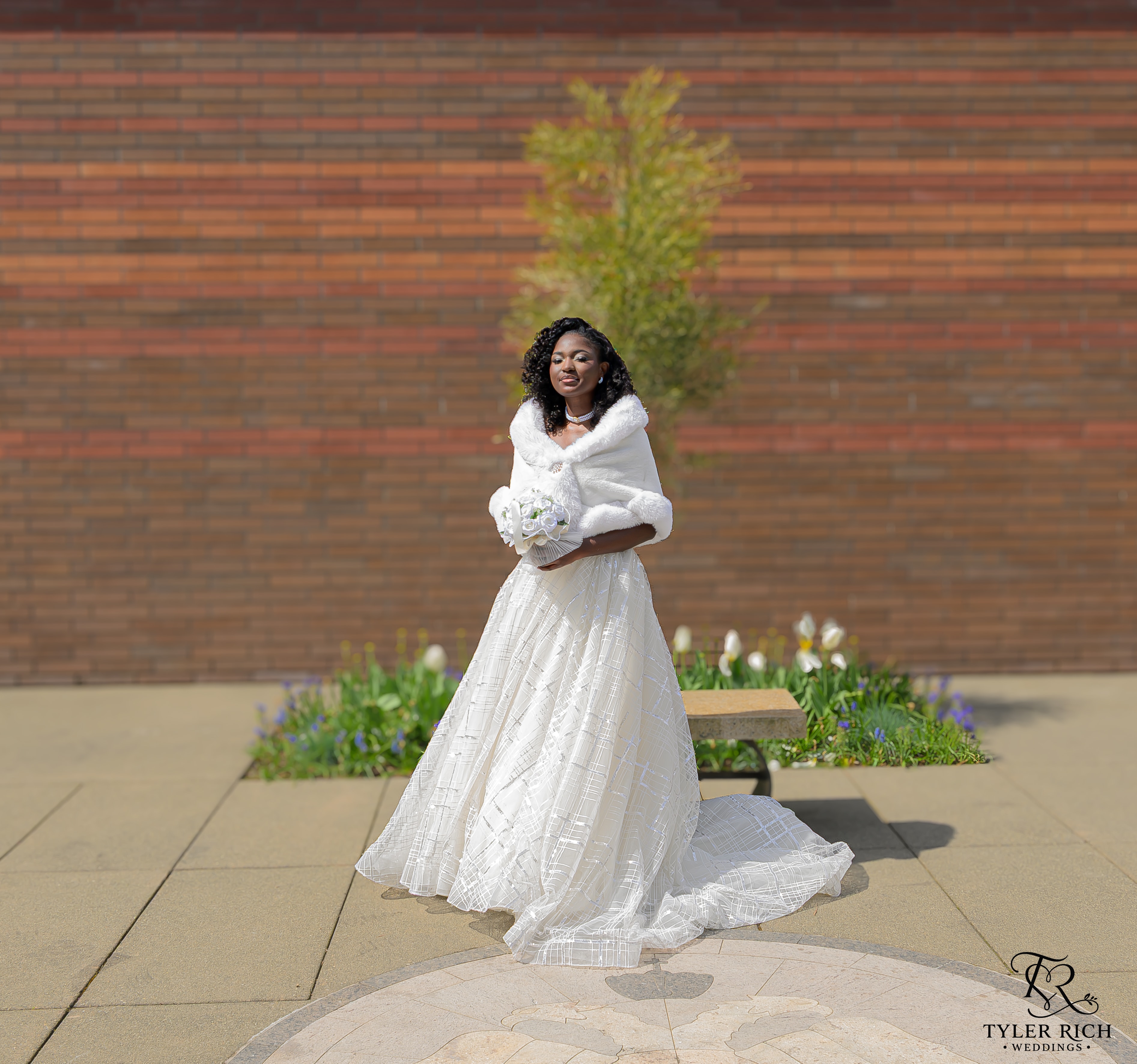 Bride in white gown outdoors